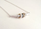 Sterling Silver Necklace with Silver and 14 k Gold Spinners