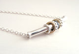 Sterling Silver Necklace with Silver and 14 k Gold Spinners