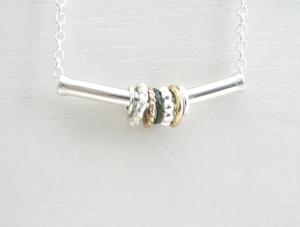 Sterling Silver Necklace with Silver and 14 k Gold Spinners